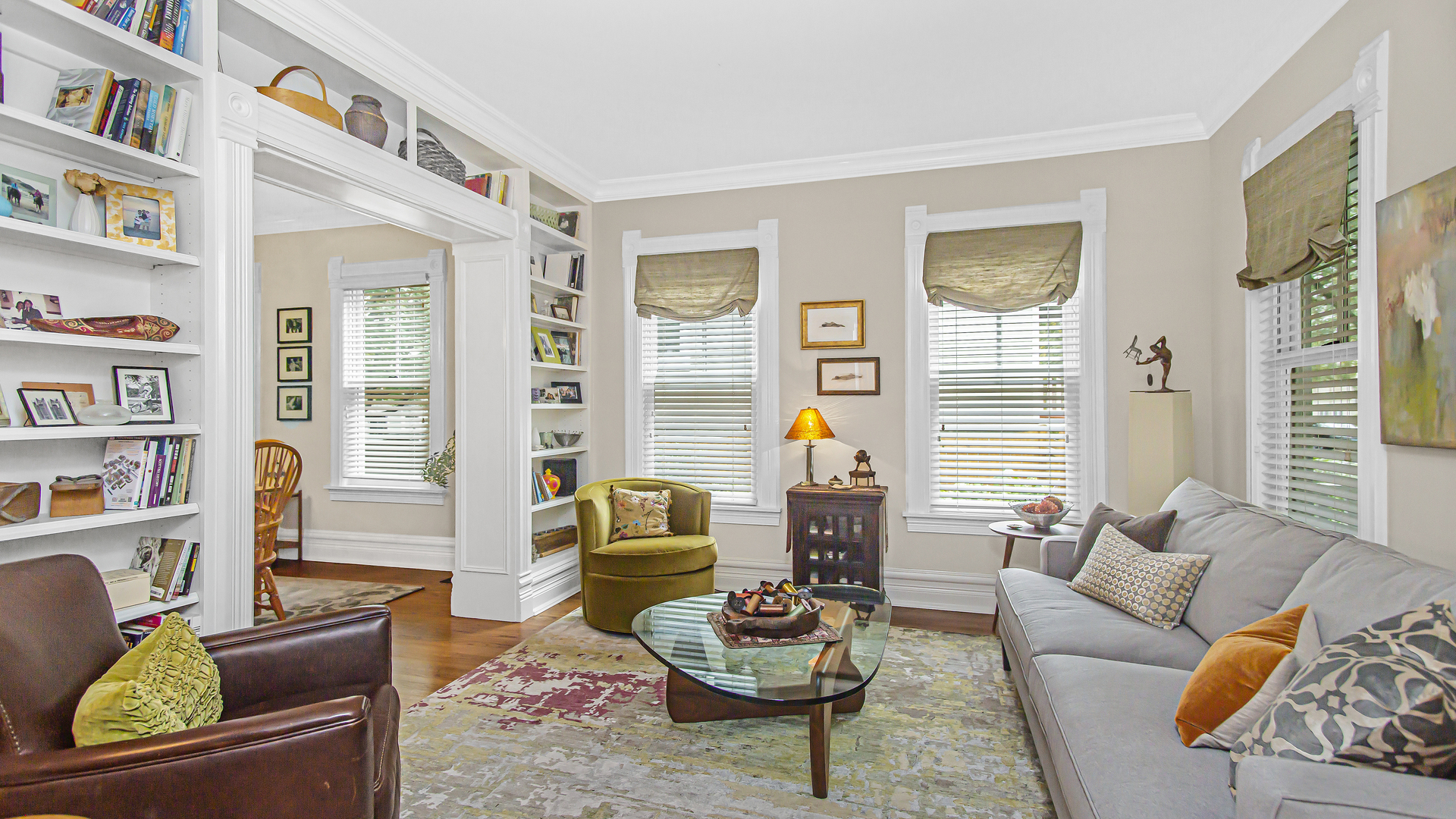 Undisclosed Address Evanston, IL 60201 - Photo 3 of 30 a living room with furniture and a book shelf