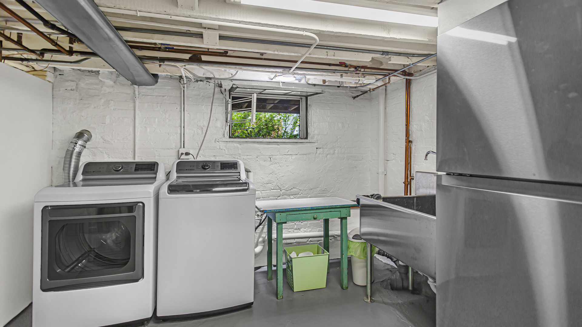 Undisclosed Address Evanston, IL 60201 - Photo 22 of 30 a utility room with dryer and washer