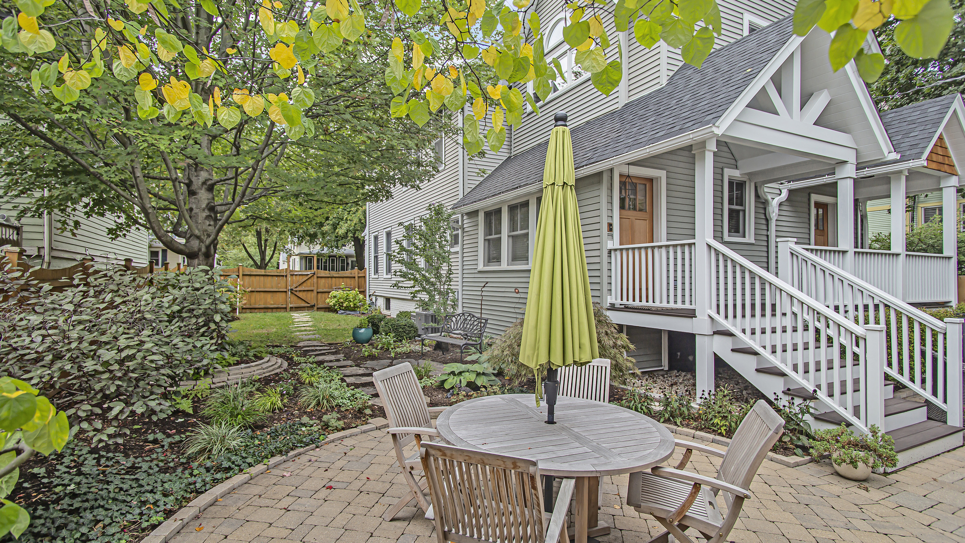 Undisclosed Address Evanston, IL 60201 - Photo 24 of 30 a backyard of a house with a table and chairs