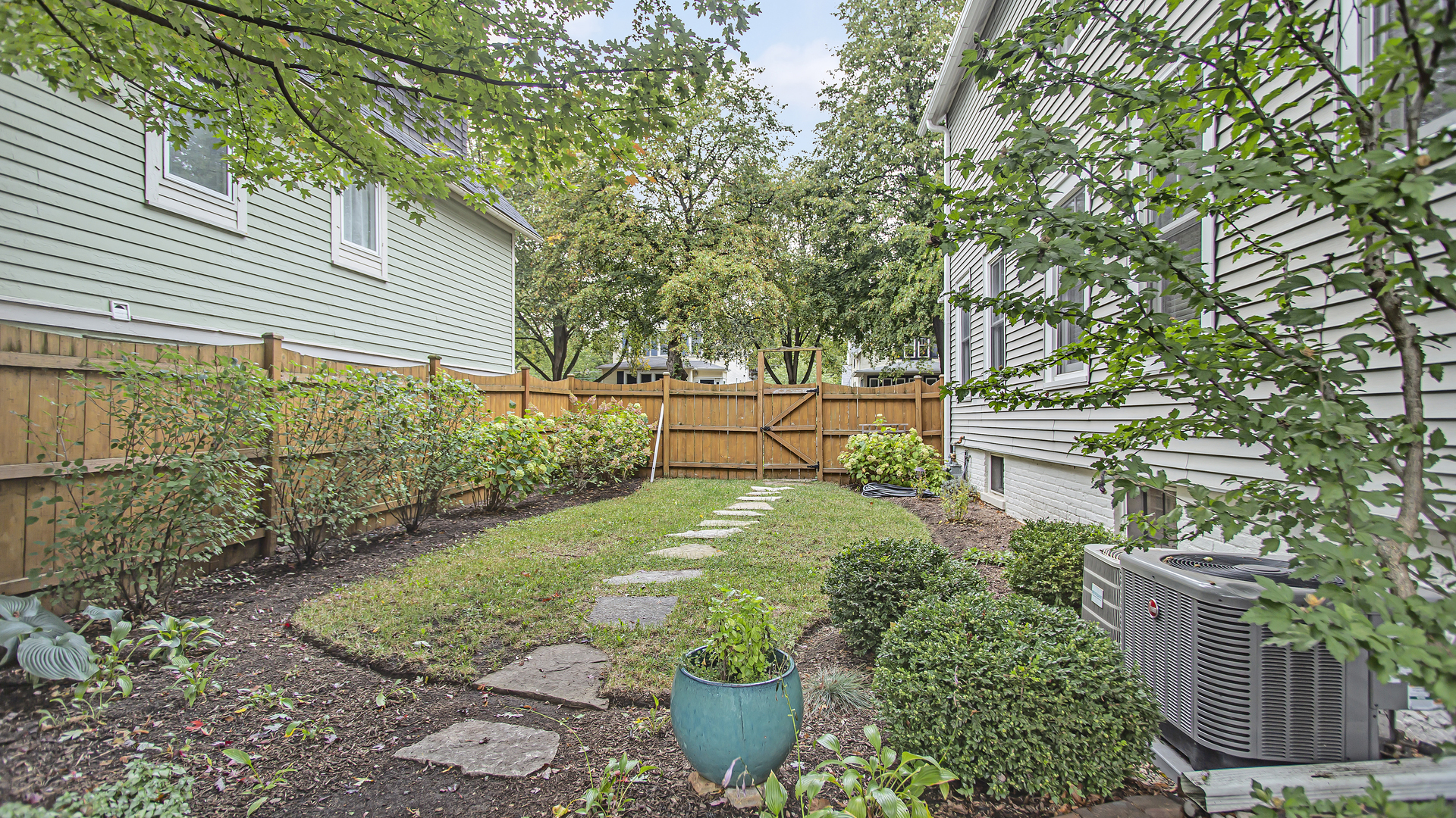 Undisclosed Address Evanston, IL 60201 - Photo 25 of 30 a view of a backyard with garden
