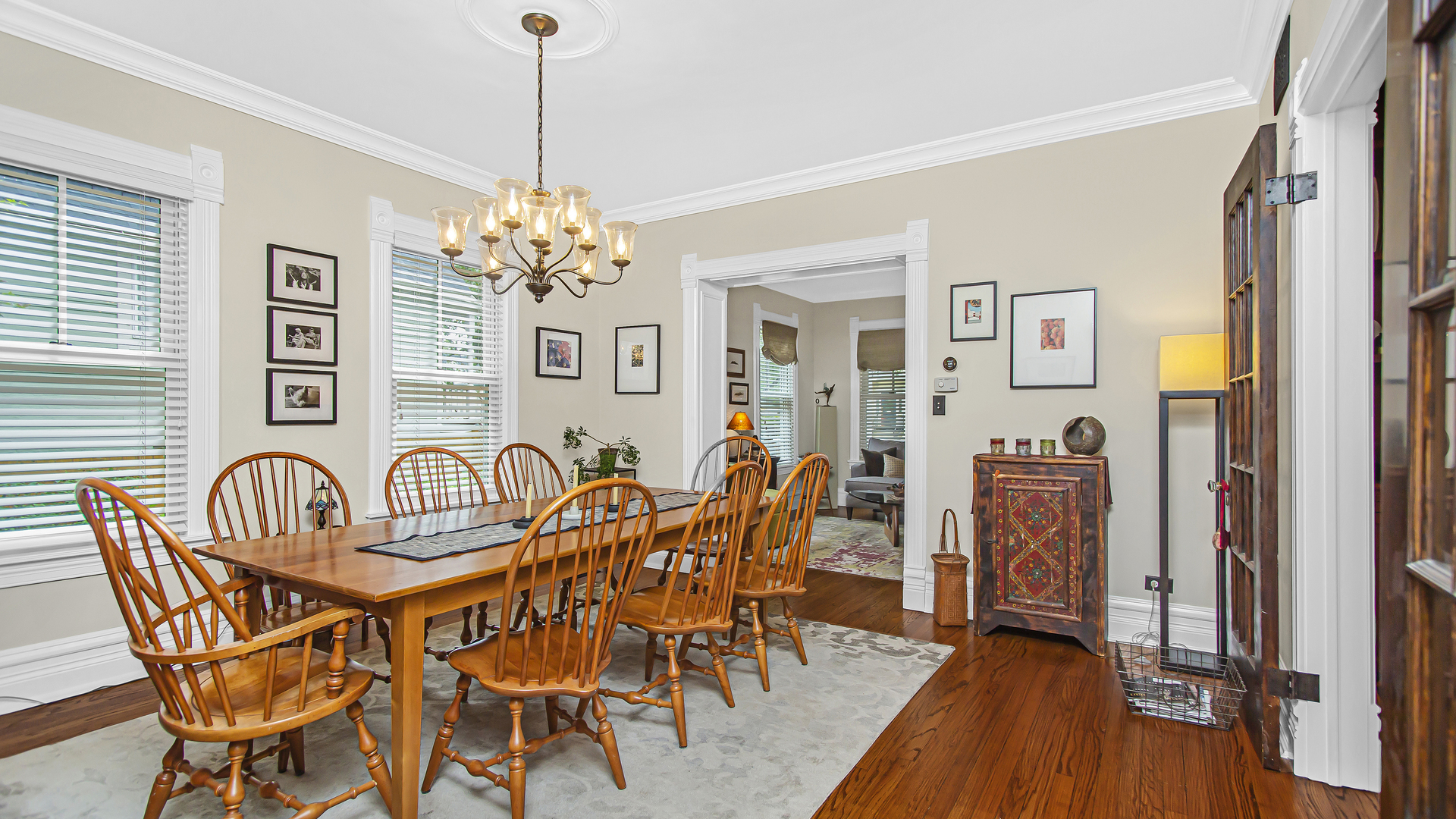 Undisclosed Address Evanston, IL 60201 - Photo 4 of 30 a dining room with furniture a chandelier and wooden floor
