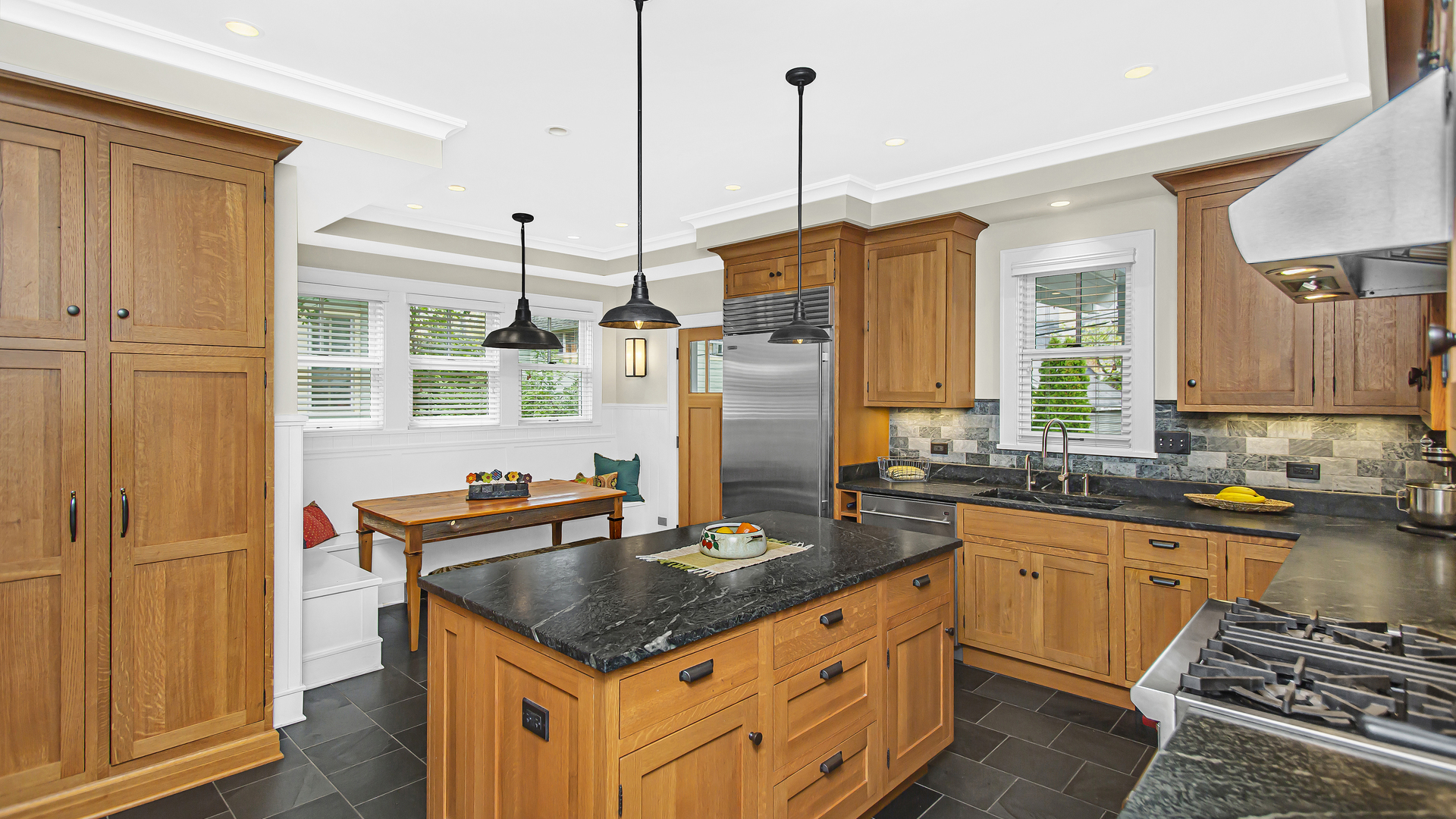 Undisclosed Address Evanston, IL 60201 - Photo 6 of 30 a kitchen with stainless steel appliances granite countertop a sink stove and cabinets