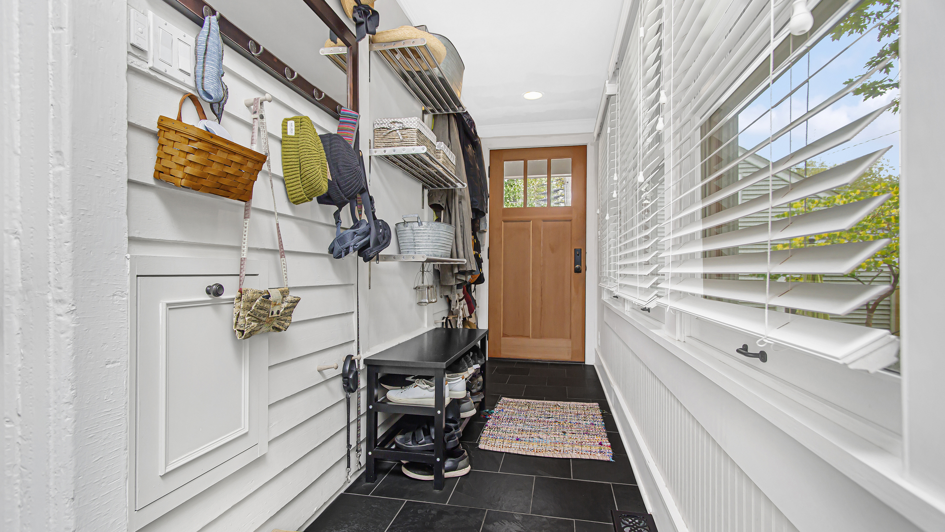 Undisclosed Address Evanston, IL 60201 - Photo 10 of 30 a view of an entryway with wooden floor and windows