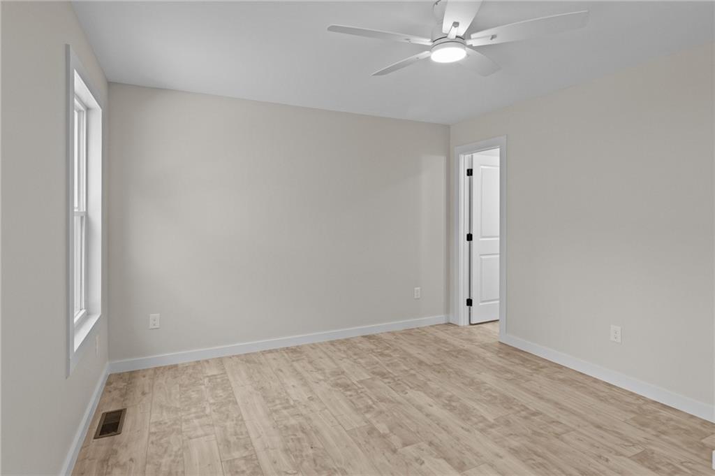 94 Orchard Road Summerville, GA 30747 - Photo 6 of 11 wooden floor in an empty room