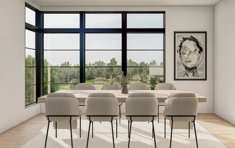 a dining room with furniture and window