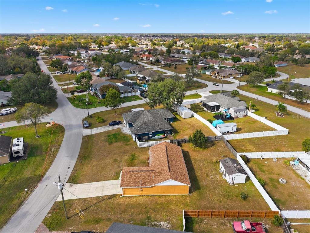 3280 Ambassador Avenue Spring Hill, FL 34609 - Photo 36 of 36 an aerial view of residential houses with outdoor space