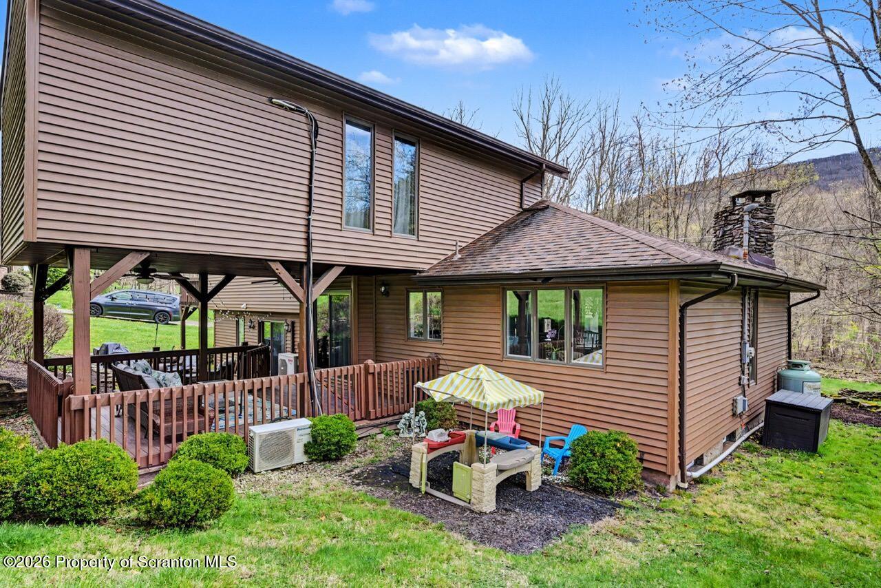 719 Scott Road Clarks Summit, PA 18411 - Photo 47 of 51 a front view of a house with garden