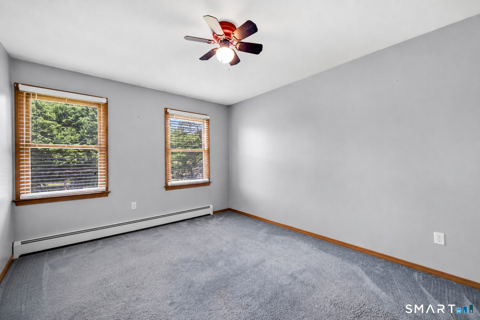 89 Windsorville Road South Windsor, CT 06074 - Photo 11 of 23 a view of an empty room with a window