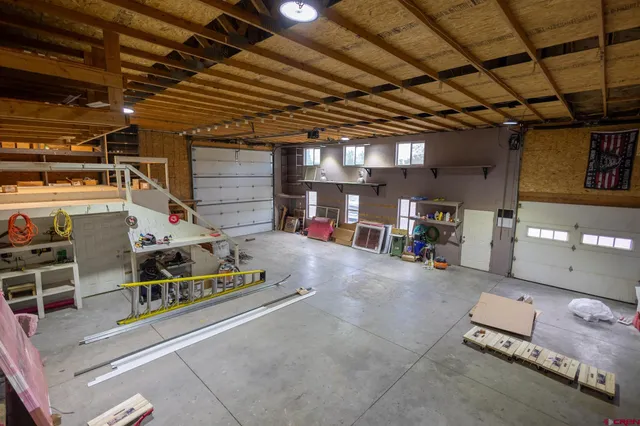 a room with lots of furniture and clutter