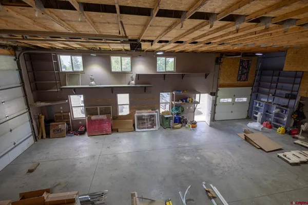 a view of a garage with storage