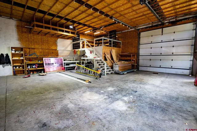 a view of a garage with storage
