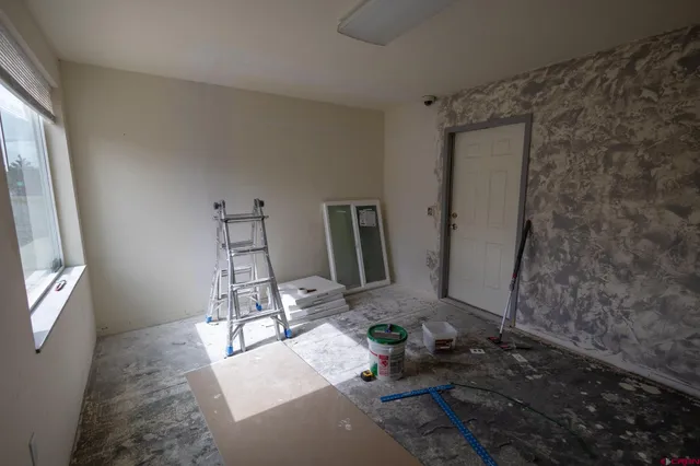 a room with furniture and a window