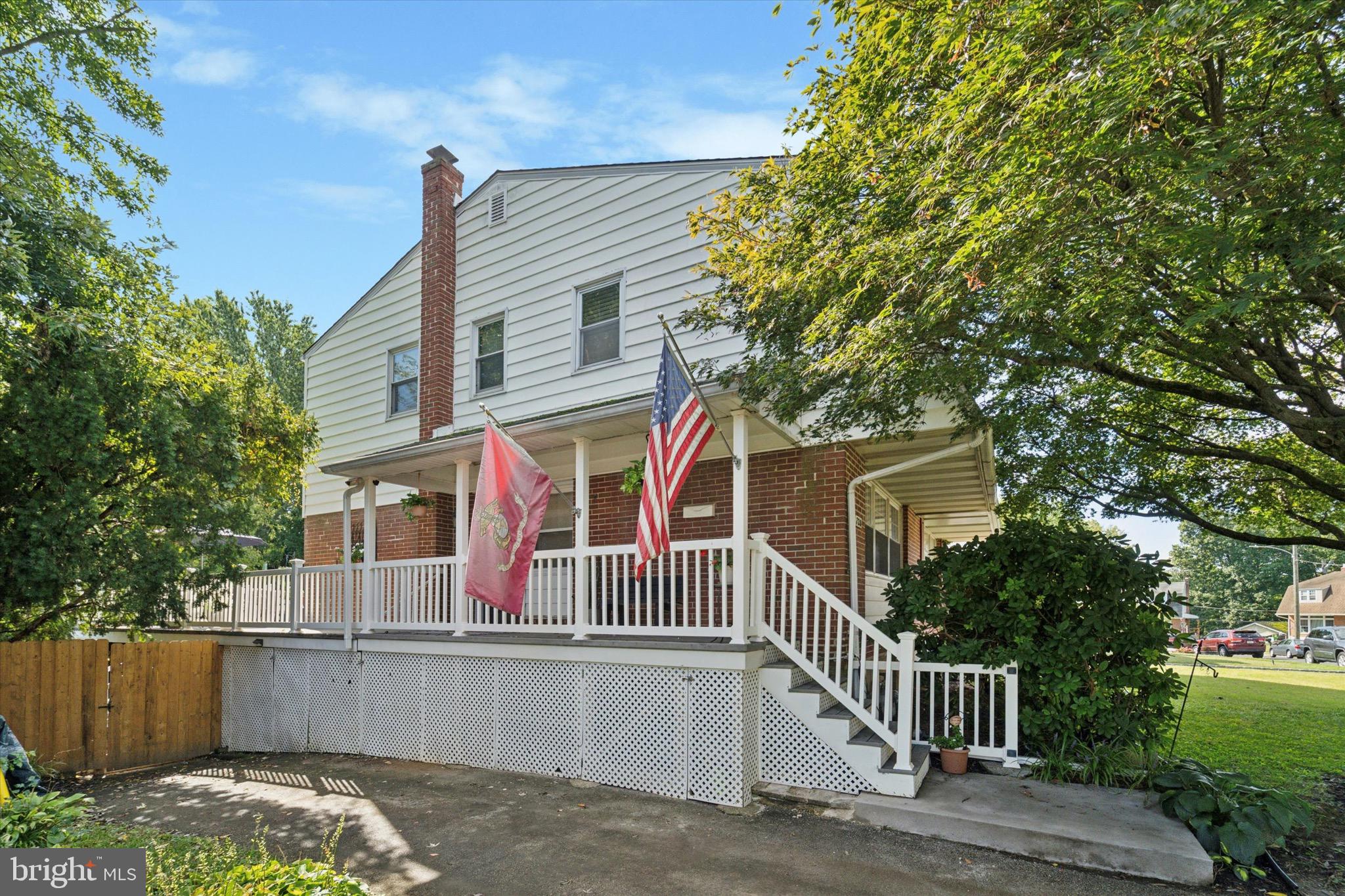 720 Swarthmorewood Lane Swarthmore, PA 19081 - Photo 23 of 25 front view of a house with a street