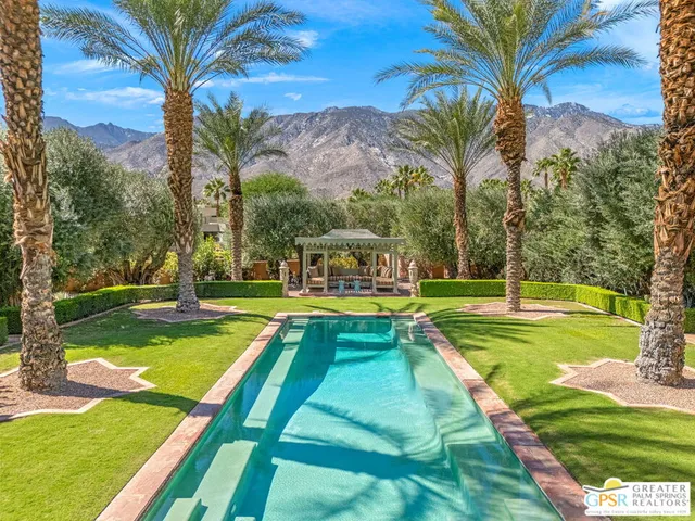 a view of a house with a swimming pool