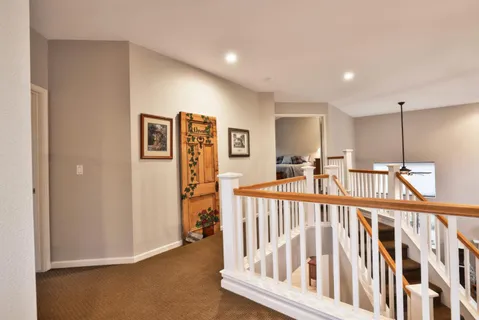 a view of a hallway with workspace