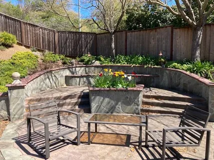 a view of a backyard with a garden