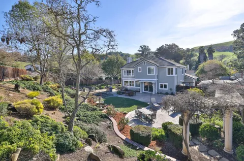 a view of a house with a garden