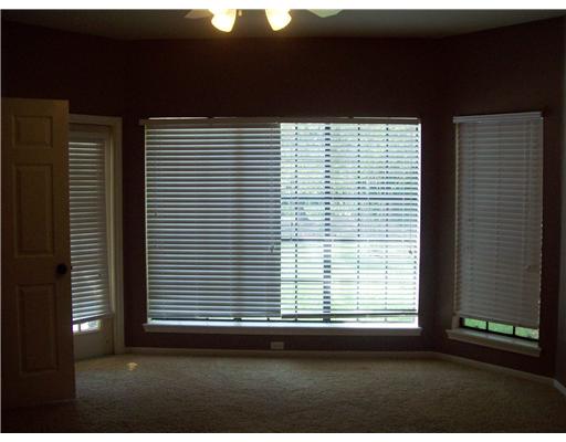 7677 Dallas Street Corpus Christi, TX 78413 - Photo 7 of 9 a kitchen with a window