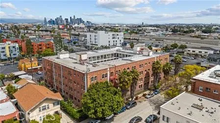 a view of a patio with table and chairs and potted plants