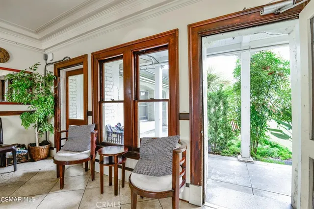 a view of an apartment with a garden