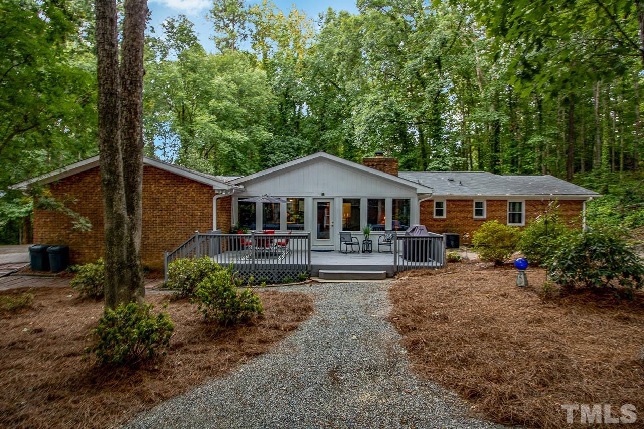 6005 Spring Valley Drive Raleigh, NC 27616 - Photo 3 of 34 a front view of a house with yard