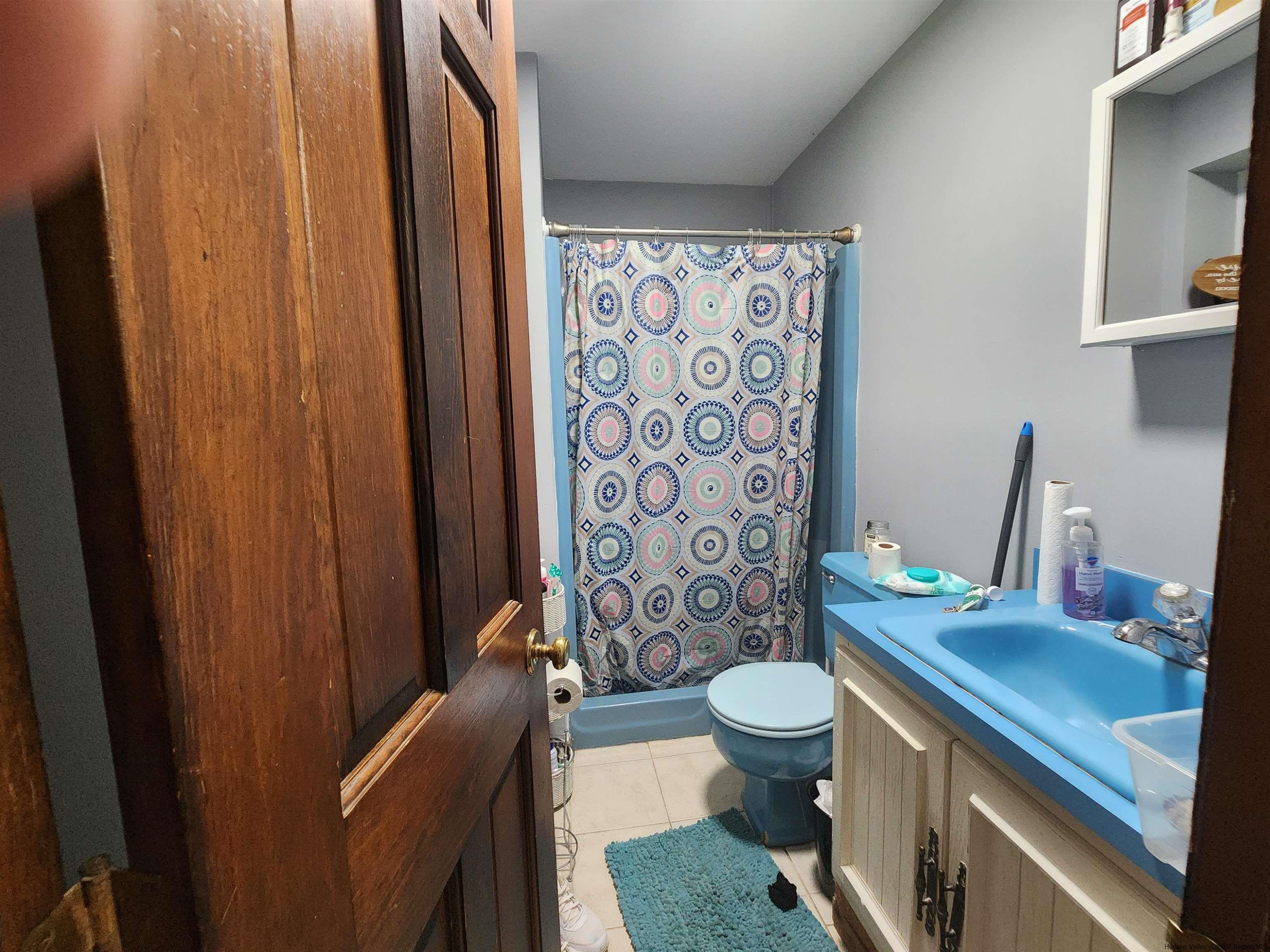 49 Old Post Road Poughkeepsie, NY 12601 - Photo 14 of 19 a bathroom with a sink toilet and shower