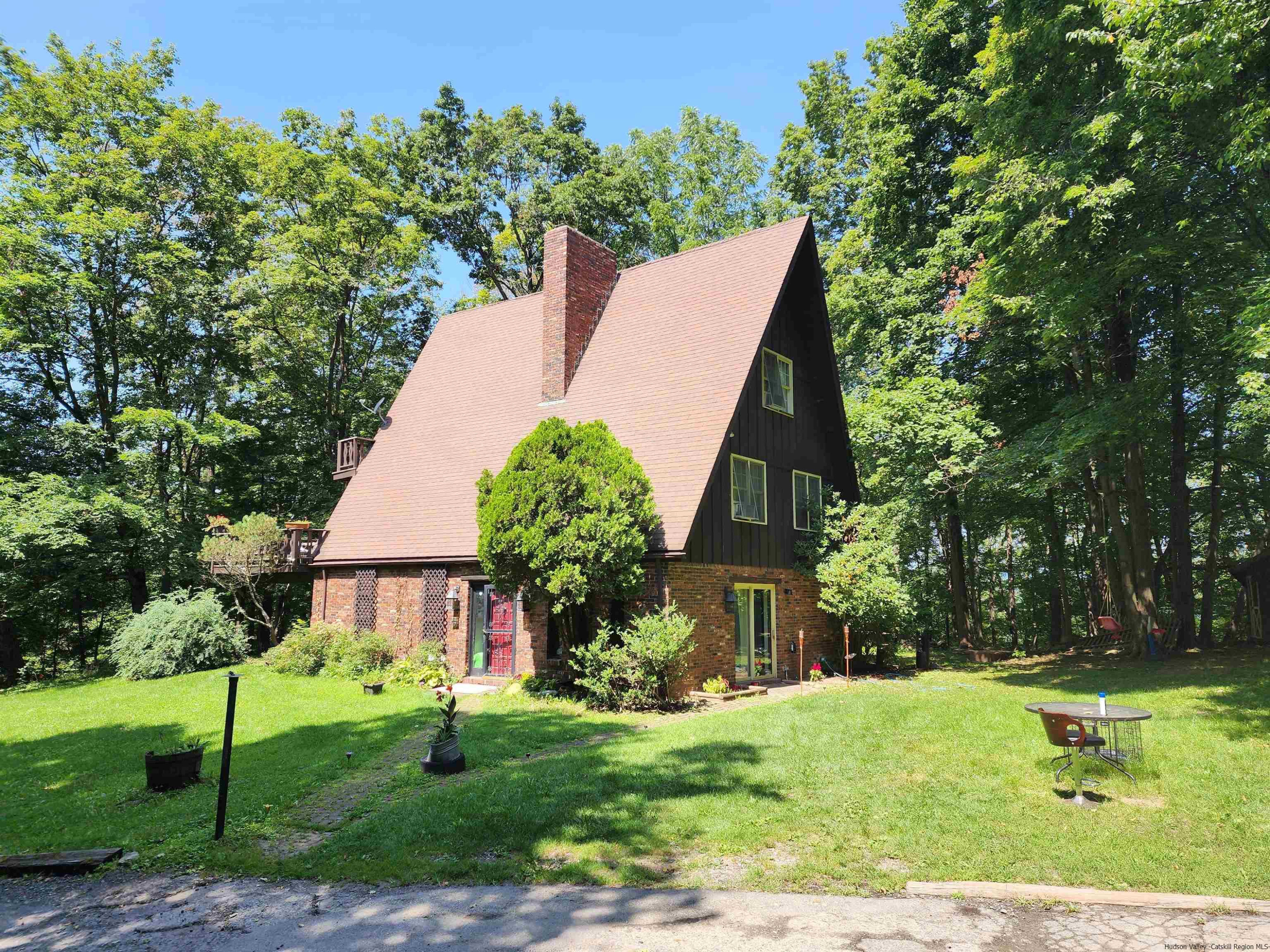 49 Old Post Road Poughkeepsie, NY 12601 - Photo 2 of 19 front view of a house with a yard