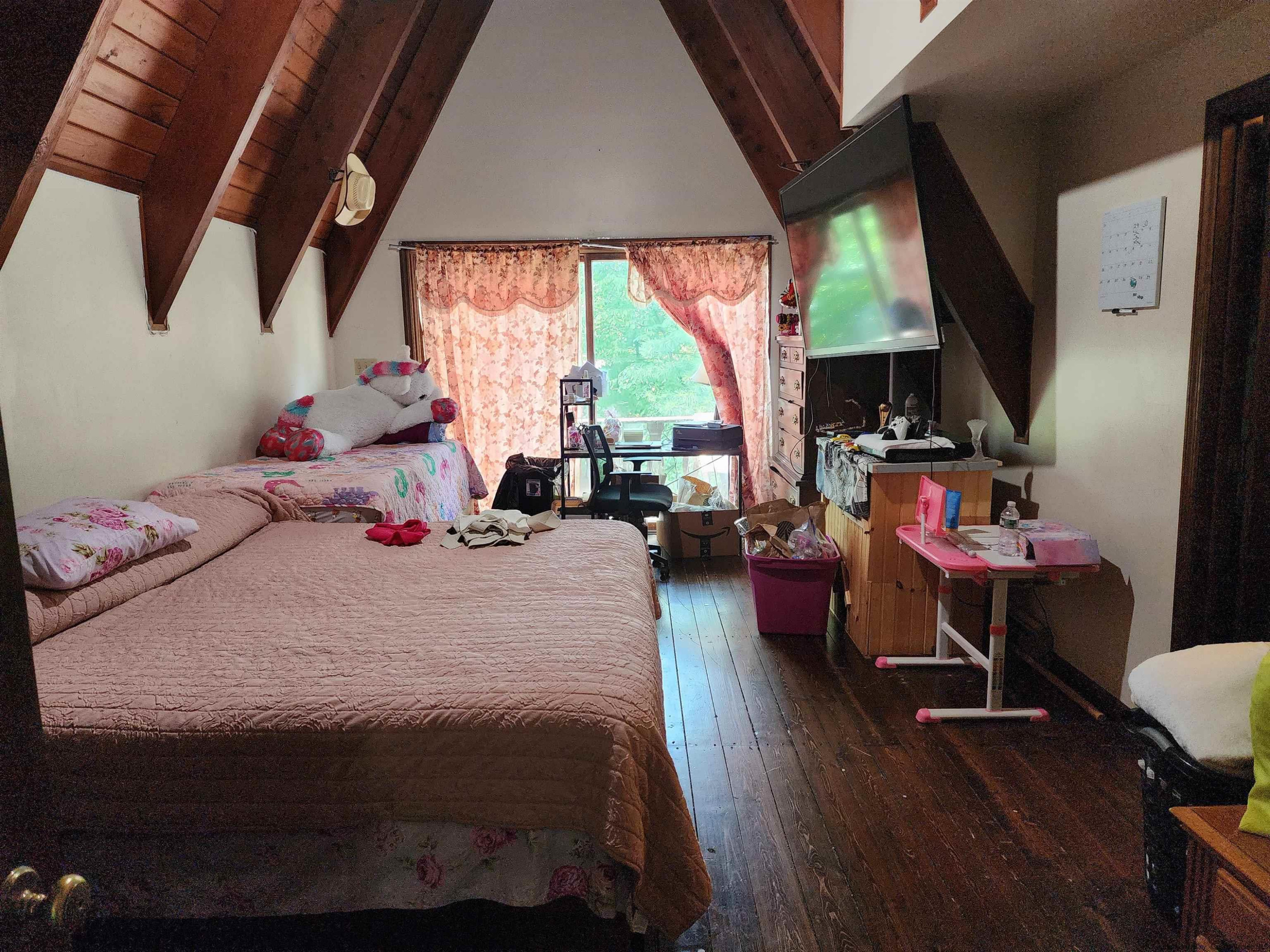 49 Old Post Road Poughkeepsie, NY 12601 - Photo 6 of 19 a bedroom with a bed a large window with wooden floor