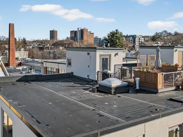 a view of a balcony with city view