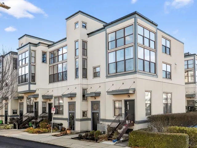 a front view of a building with glass windows