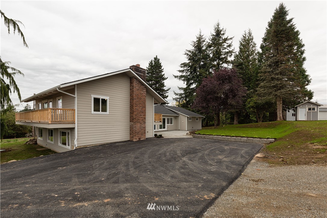 33114 Sultan Basin Road Sultan, WA 98294 - Photo 2 of 30 a view of a house with a yard