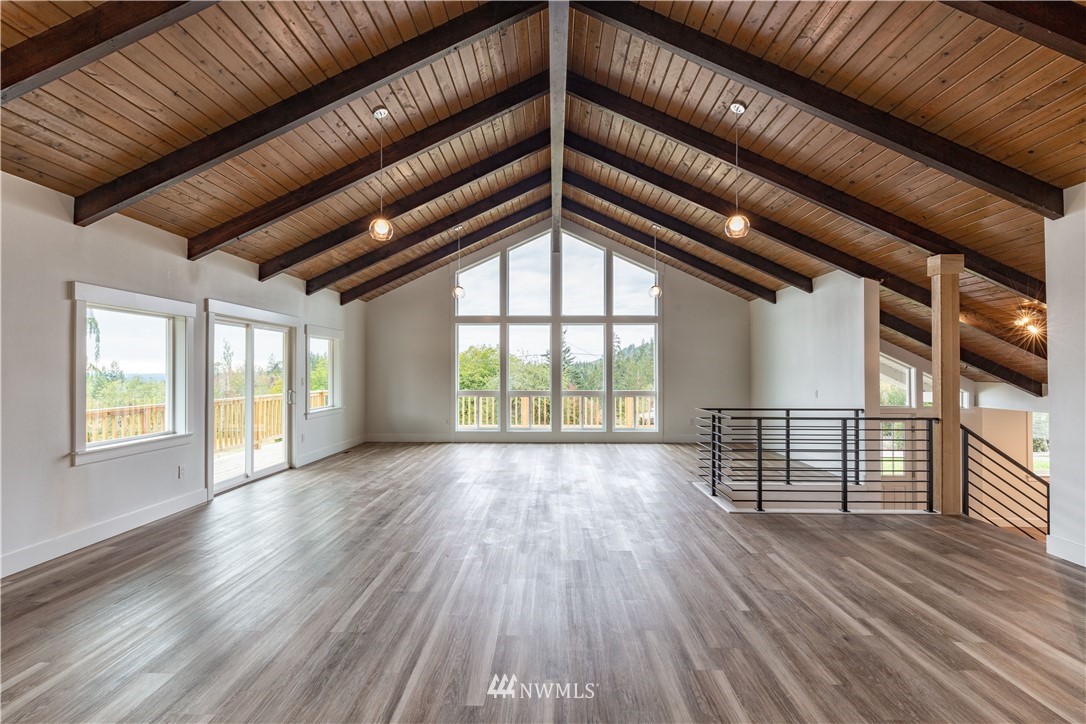 33114 Sultan Basin Road Sultan, WA 98294 - Photo 15 of 30 wooden floor in an empty room with a window