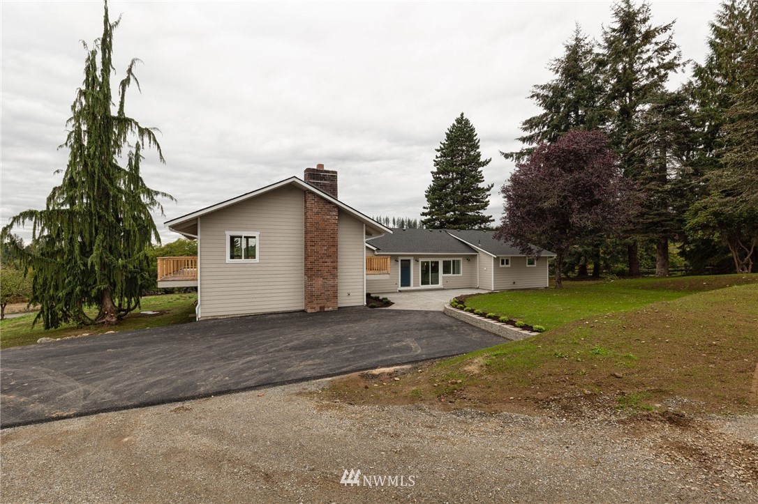 33114 Sultan Basin Road Sultan, WA 98294 - Photo 3 of 30 a view of a house with a yard