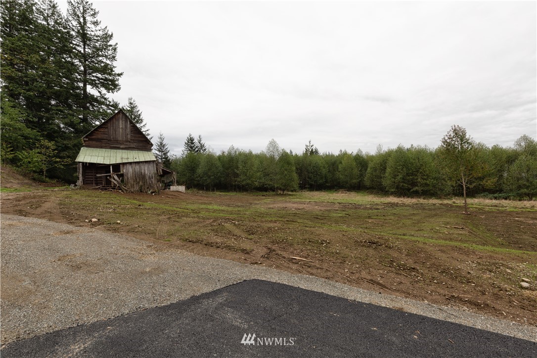 33114 Sultan Basin Road Sultan, WA 98294 - Photo 30 of 30 a view of a house with a yard