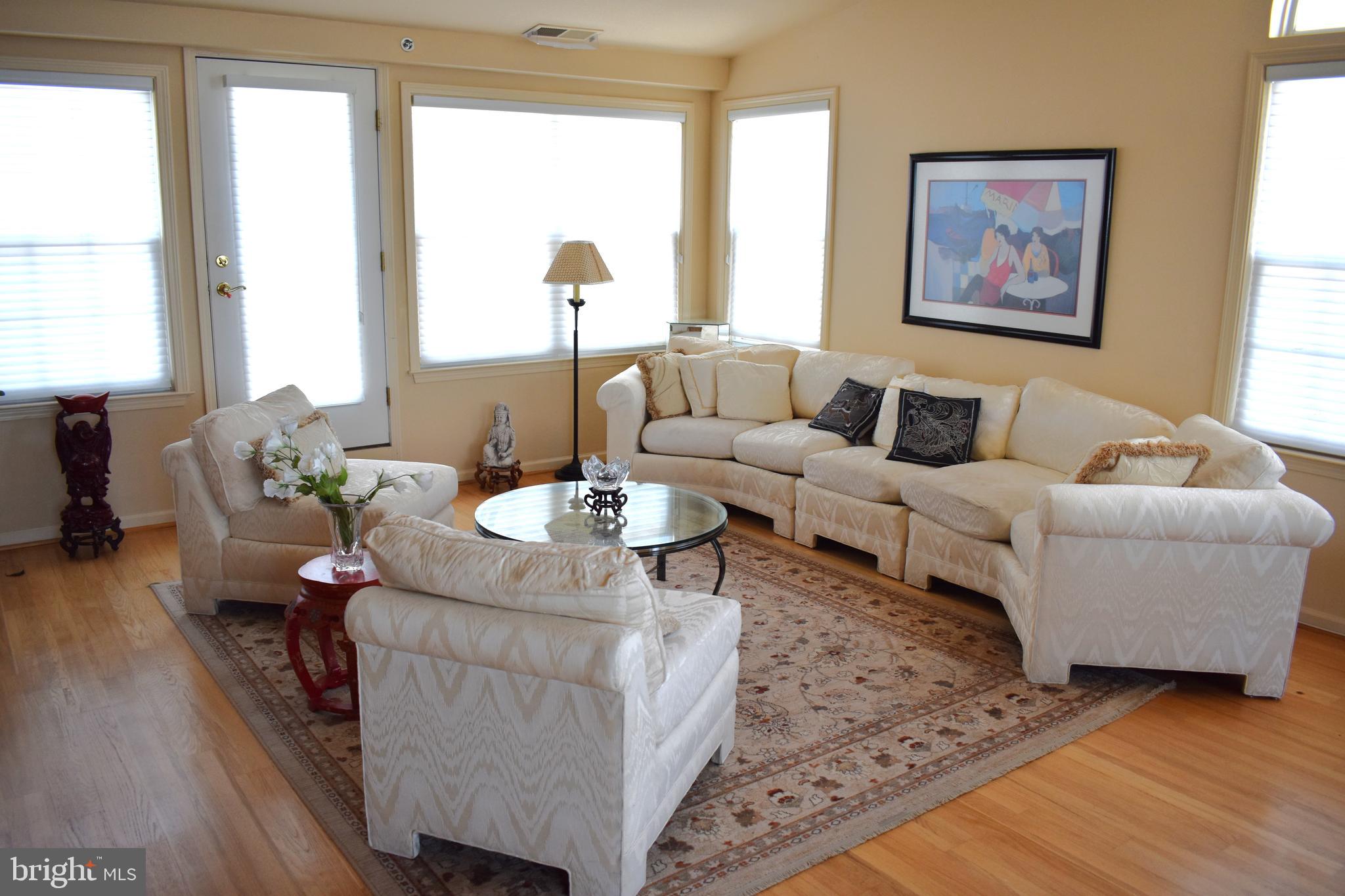 3409 Centennial Station Warminster, PA 18974 - Photo 11 of 76 a living room with furniture and wooden floor