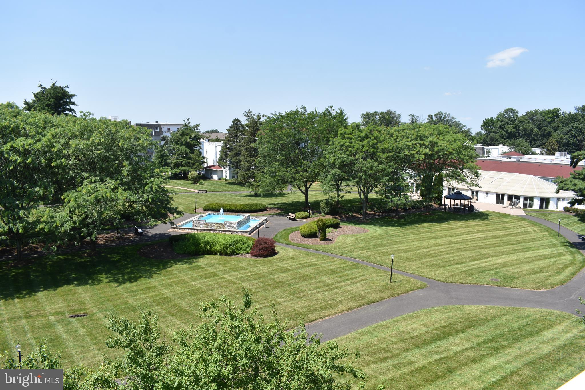 3409 Centennial Station Warminster, PA 18974 - Photo 17 of 76 a view of a garden with large trees