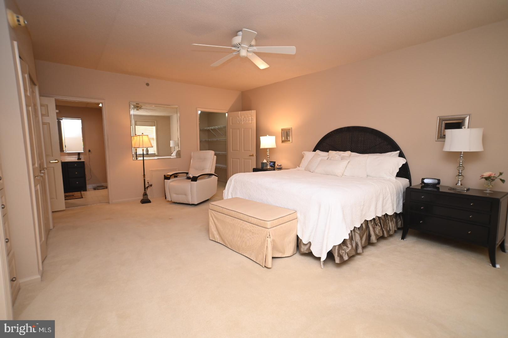 3409 Centennial Station Warminster, PA 18974 - Photo 19 of 76 a spacious bedroom with a bed and ceiling fan
