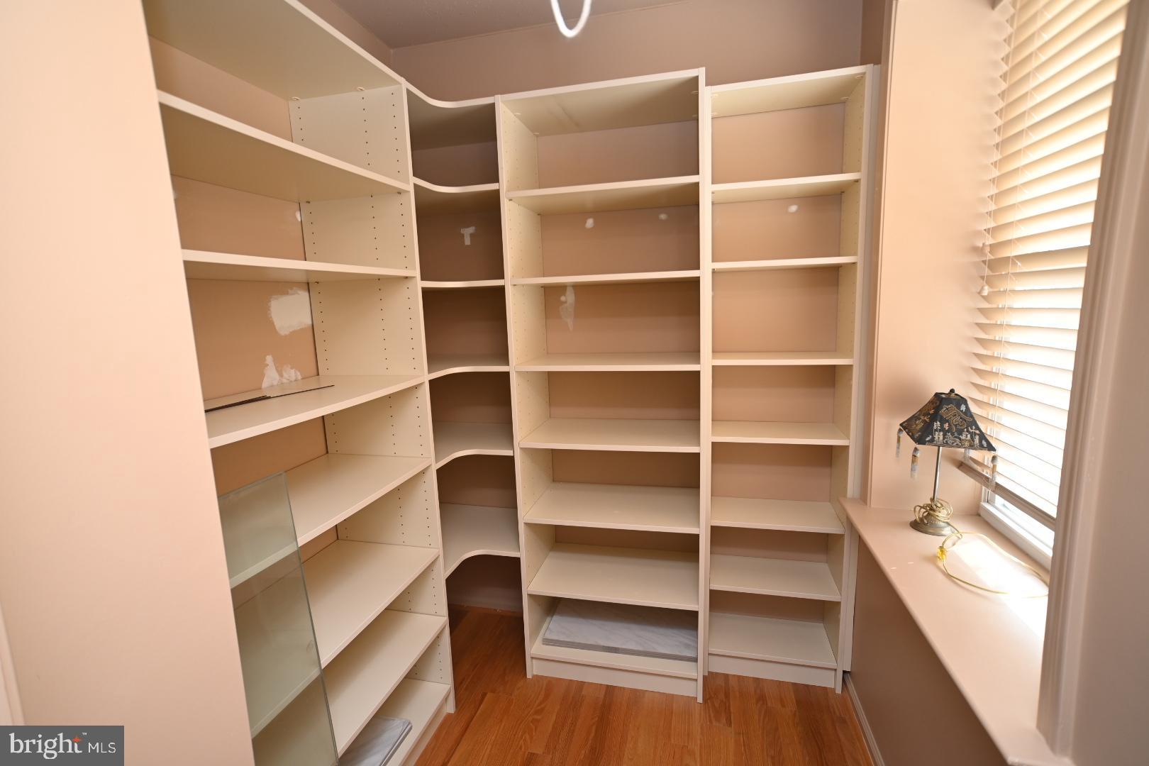 3409 Centennial Station Warminster, PA 18974 - Photo 23 of 76 a view of walk in closet with empty racks