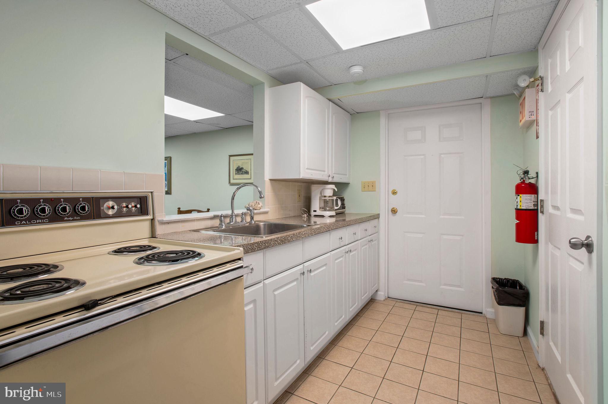 3409 Centennial Station Warminster, PA 18974 - Photo 45 of 76 a kitchen with a sink and cabinets