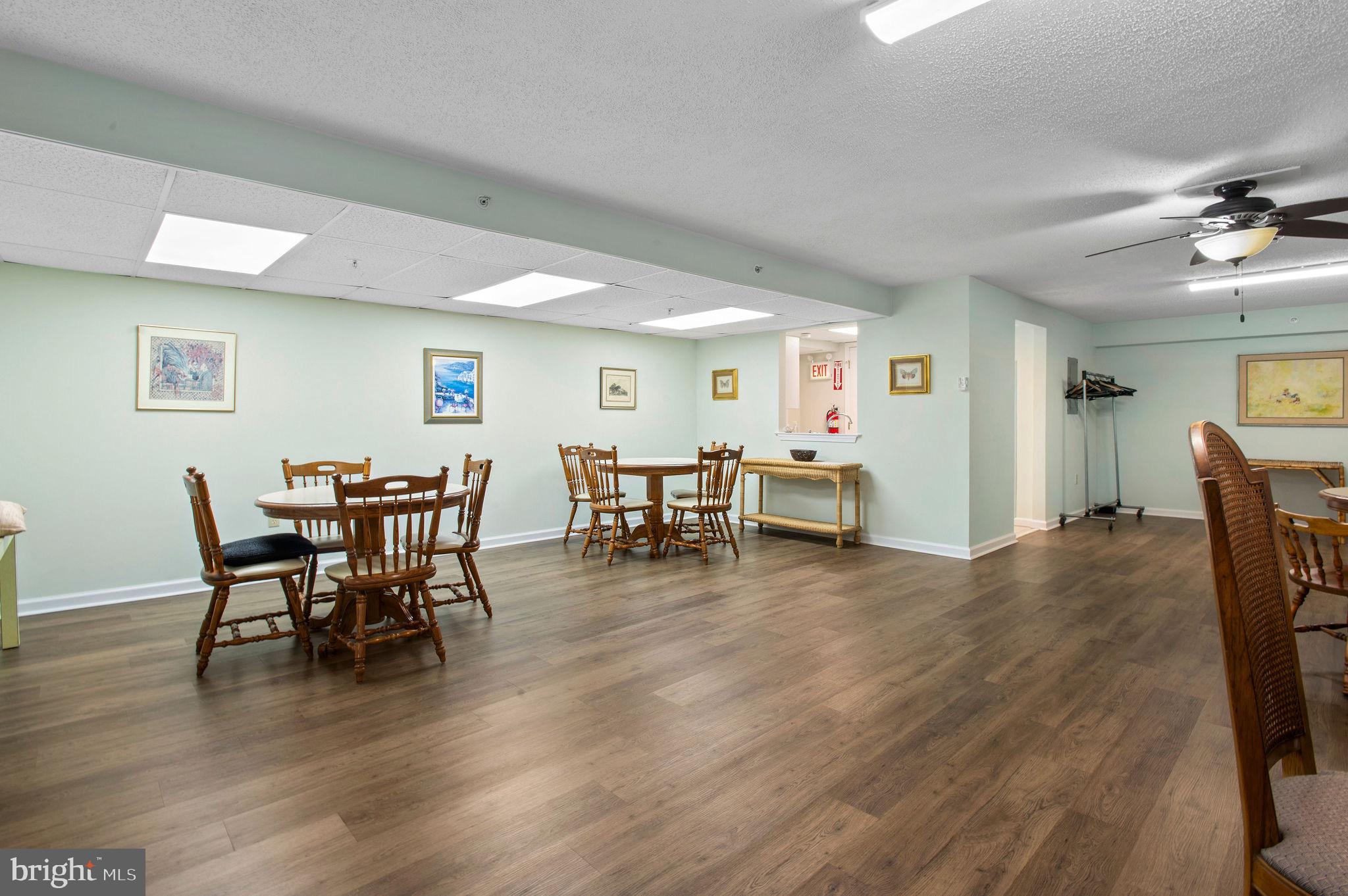 3409 Centennial Station Warminster, PA 18974 - Photo 46 of 76 a view of a dining room with furniture and wooden floor