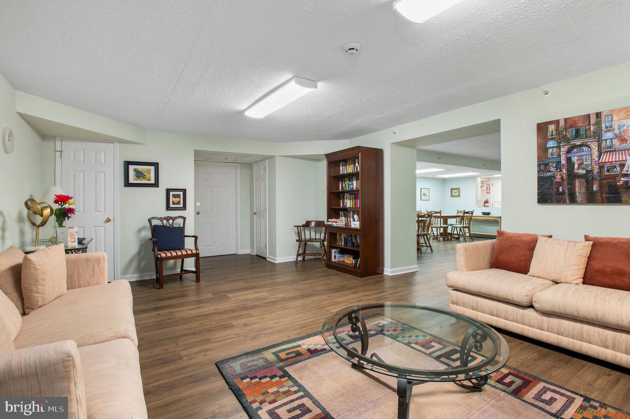 3409 Centennial Station Warminster, PA 18974 - Photo 47 of 76 a living room with furniture and wooden floor