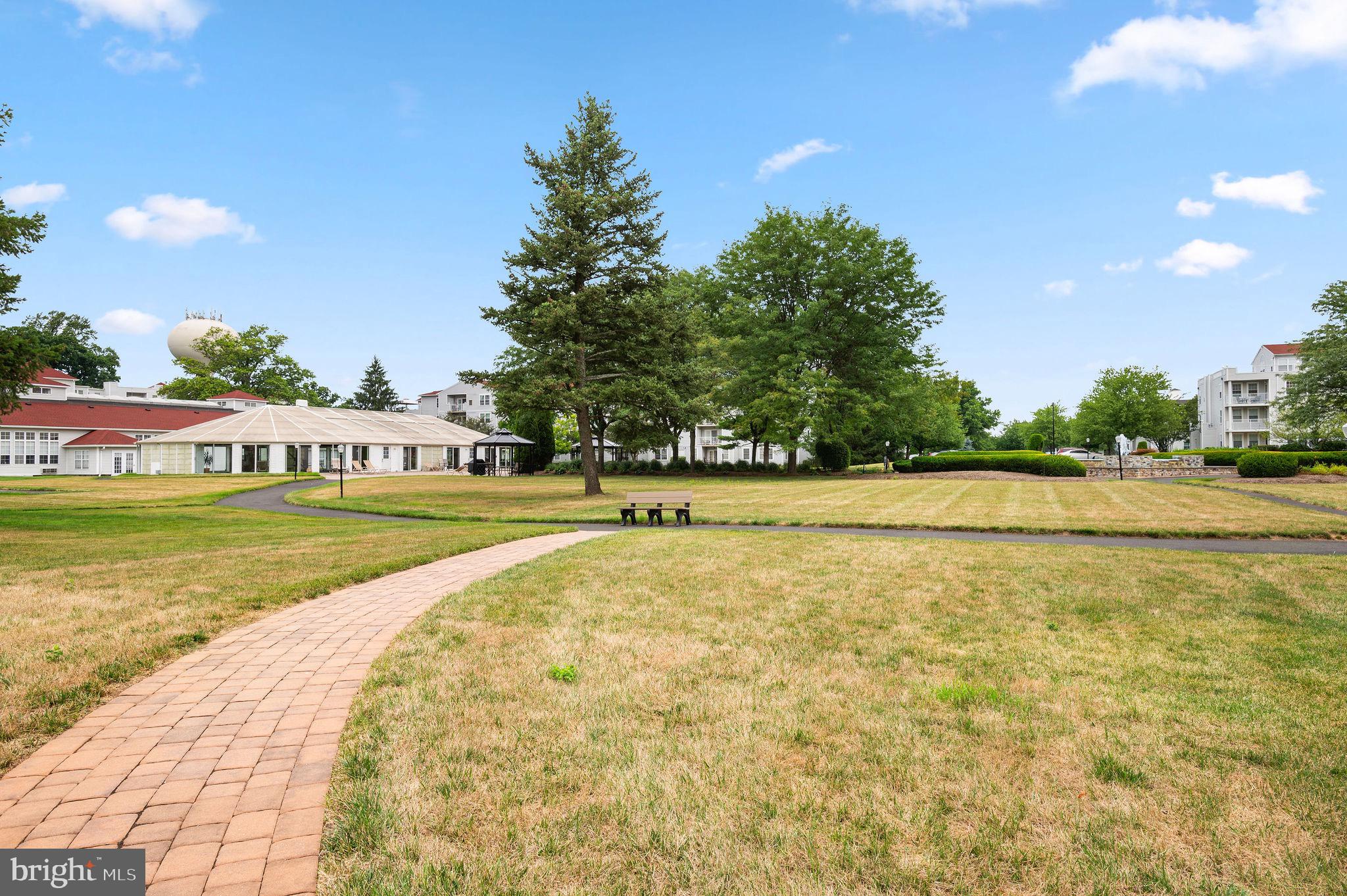 3409 Centennial Station Warminster, PA 18974 - Photo 67 of 76 a view of an swimming pool and trees in the background