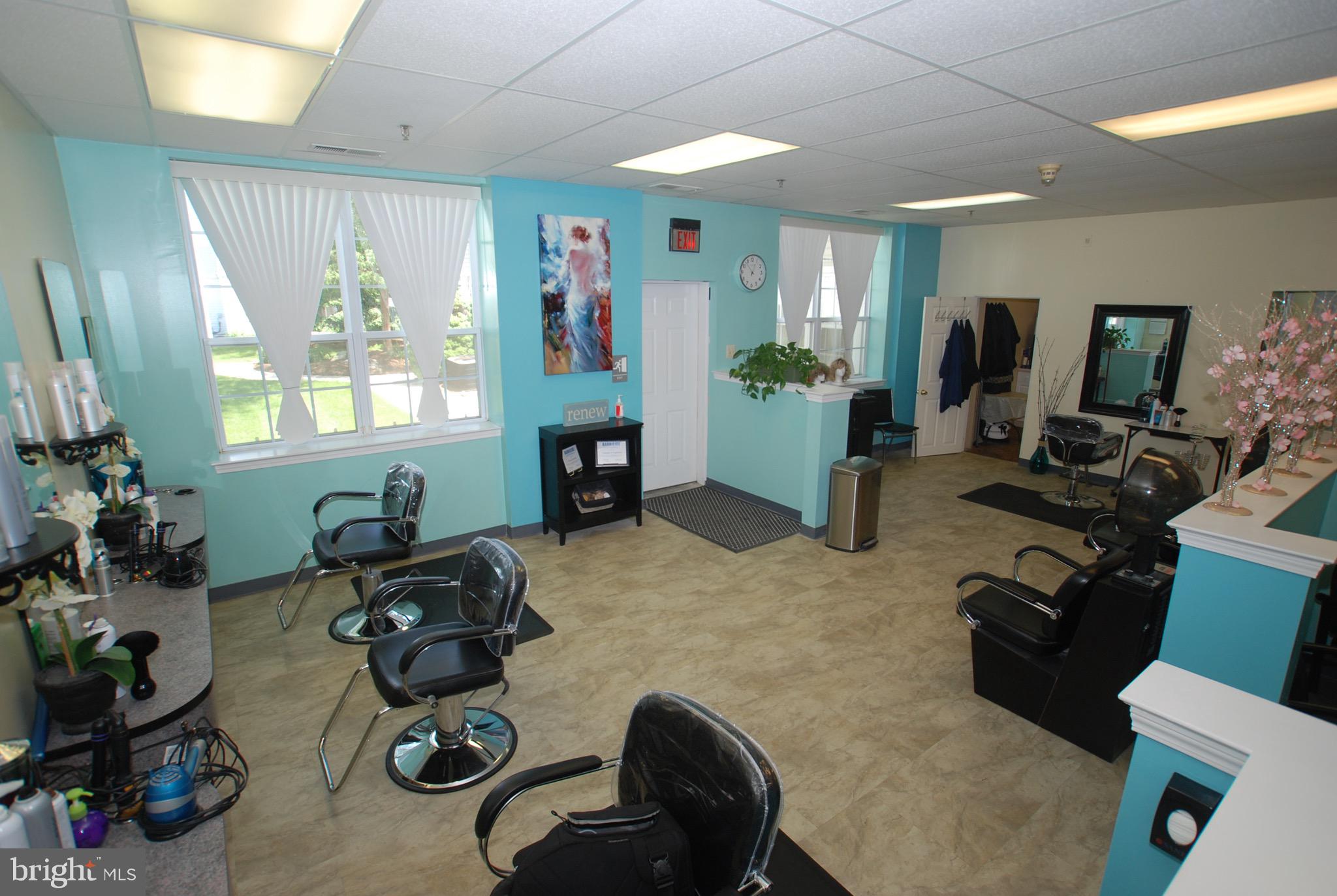 3409 Centennial Station Warminster, PA 18974 - Photo 72 of 76 a room with furniture a window and gym equipment