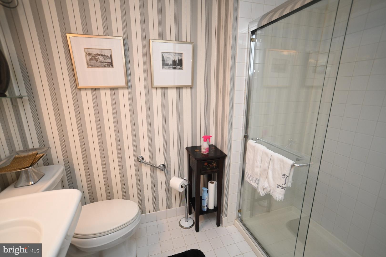 3409 Centennial Station Warminster, PA 18974 - Photo 75 of 76 a bathroom with a toilet and a shower curtain