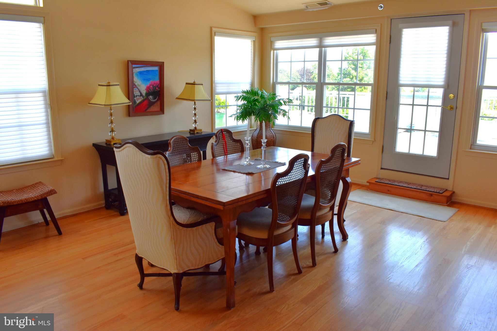 3409 Centennial Station Warminster, PA 18974 - Photo 10 of 76 a view of a dining room with furniture window and outside view
