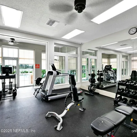 a view of a room with gym equipment