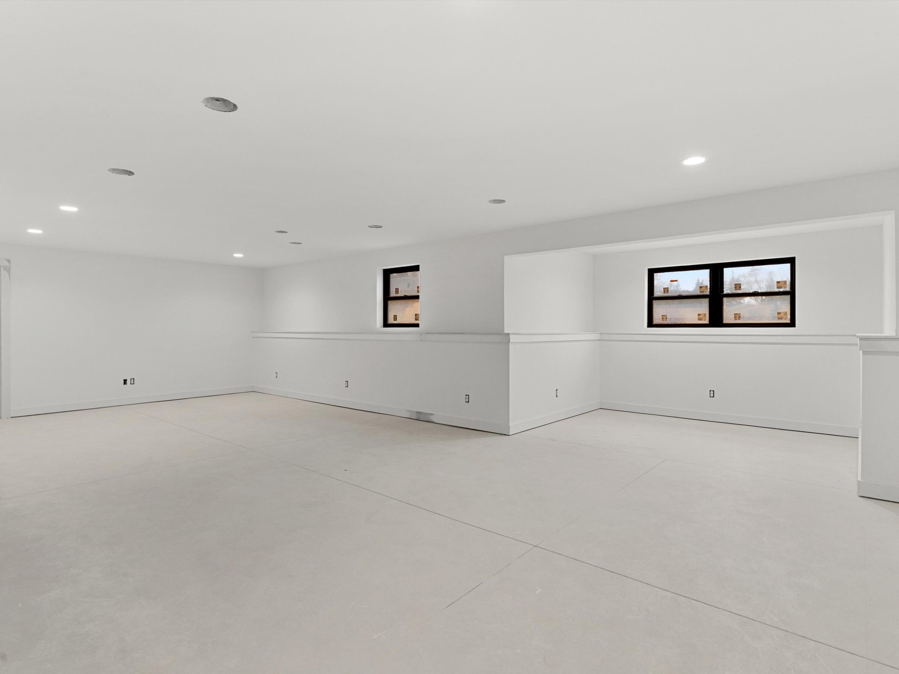947 Berenschot Trail Cedar Grove, WI 53013 - Photo 19 of 25 Lower level Living Room