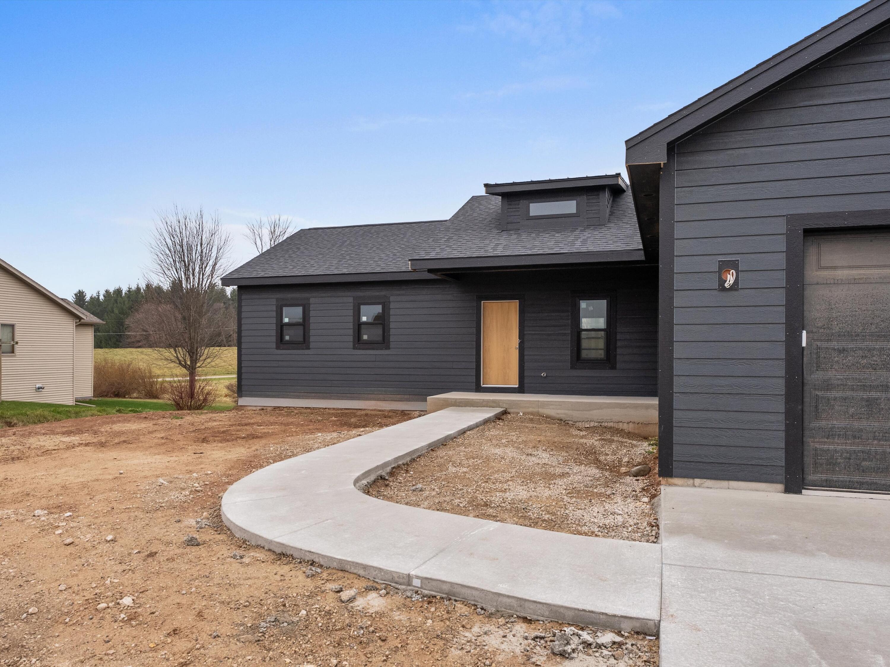 947 Berenschot Trail Cedar Grove, WI 53013 - Photo 23 of 25 concrete walkway