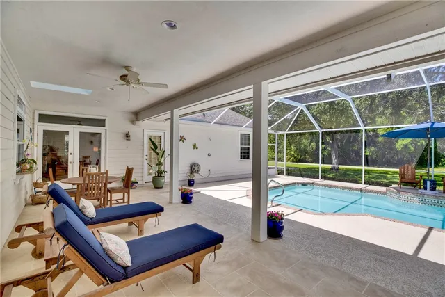 a living room with couch and a table