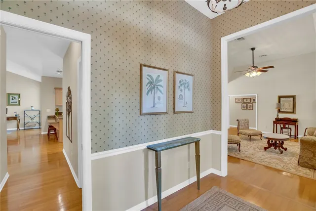 a view of a livingroom with furniture and workspace